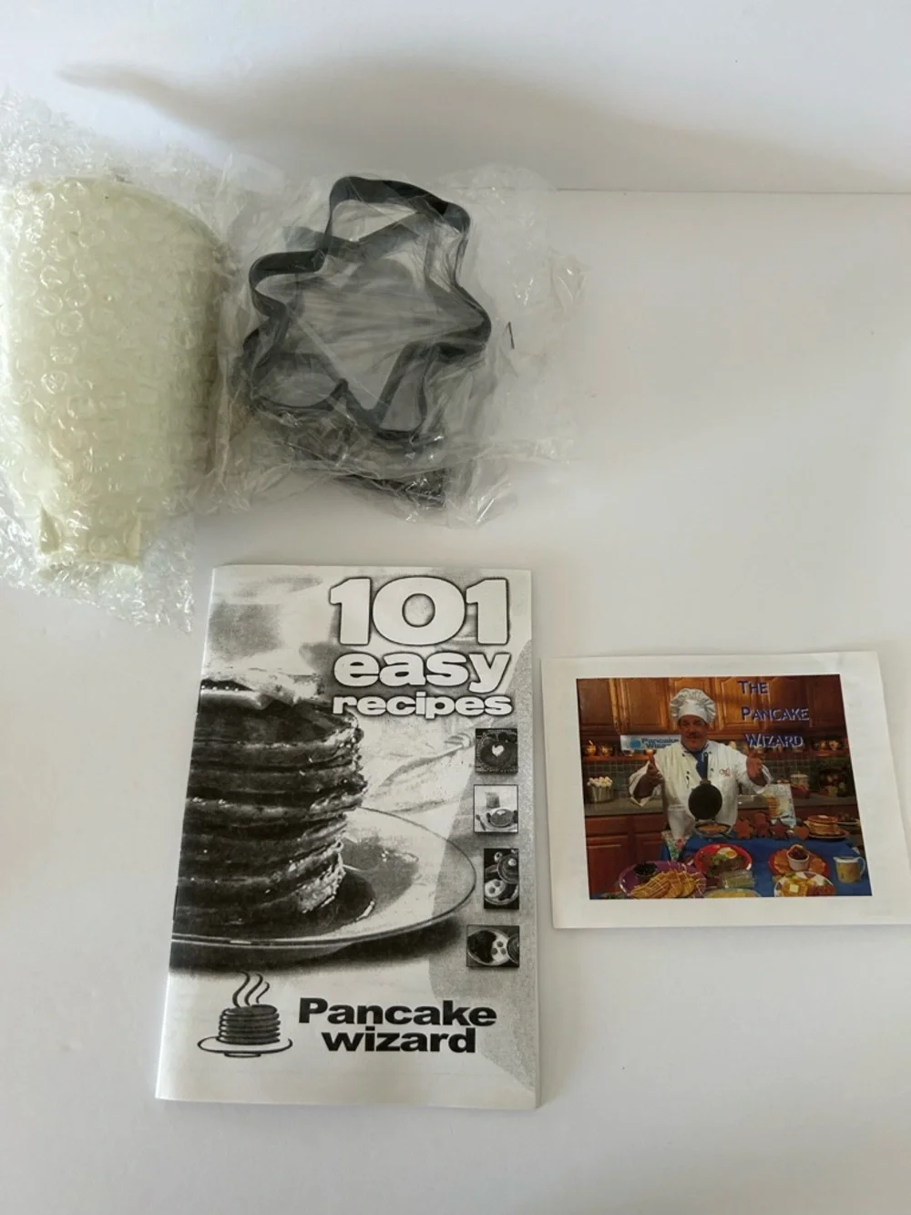 VTG “Pancake Wizard” Set includes: Pan, Batter Dispenser, Booklet, and 4 Shapes
